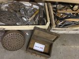 a box full of assorted tools sitting on the floor