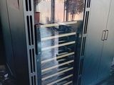 an image of a wine cooler in a garage