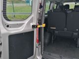 a van with the doors open and the seats down