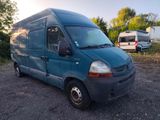 an image of a blue van parked in a parking lot