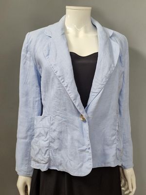 an image of a woman ' s blue jacket on a mannequin head