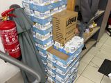 a stack of boxes stacked on top of each other in a room