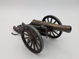 an image of a model of a cannon on a white background