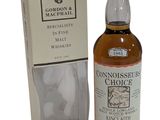 a bottle of gordon ' s choice single malt whisky in front of a box