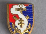a close up of a badge with a cross on it