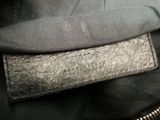 an image of a close up of a black purse
