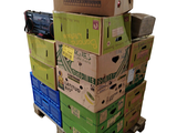 many boxes stacked on top of each other on a pallet