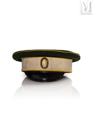 an image of a military hat with a gold emblem on it