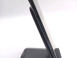 a close up of a cell phone on a stand