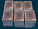 several stacks of cards are stacked on top of each other
