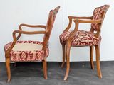 two wooden chairs with upholstered upholstered upholstered upholstered upholstered upholstered upholstered upholstered