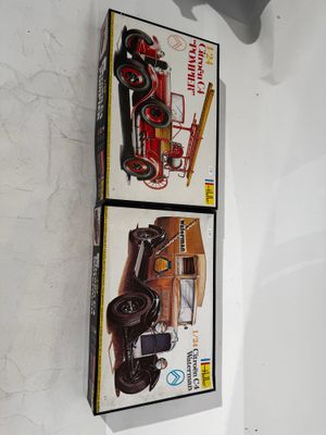 two boxes that are on the wall of a room