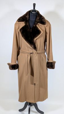 an image of a coat with a fur collar on a mannequin