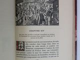 an open book with a picture of a group of people on it