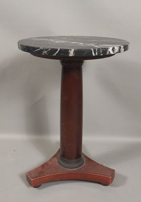 a black and white marble top table with a wooden base