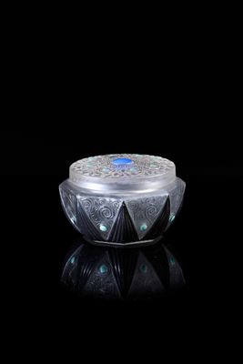 an image of a candle that is lit up in the dark