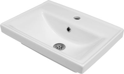 un gros plan d'un lavabo de salle de bains muni d'un siphon