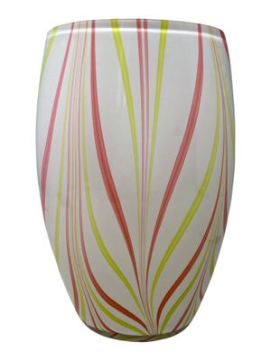 a white vase with a red, yellow, and green design on it