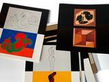 many cards with different designs on them on a white surface