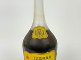 an image of a bottle of liquor sitting on top of a table