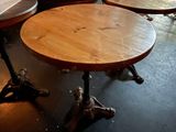 three tables that are sitting on the floor in a room