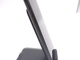 a cell phone that is sitting on a stand