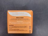 a close up of a box of soap on a black surface