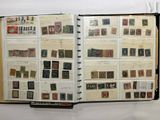 an open book with a lot of stamps on it
