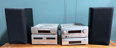a lot of speakers that are sitting on a table