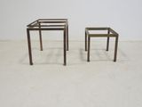pair of brass side tables with glass tops