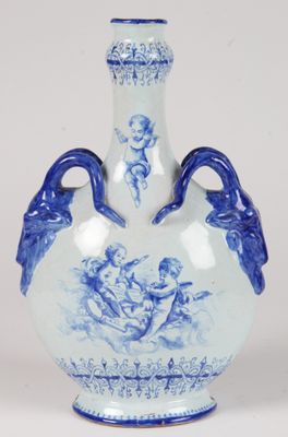 a blue and white vase with two birds on it