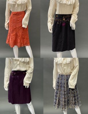 four different styles of skirts and blouses on mannequin mannequin mannequin mannequin mannequin mannequin mannequin manne