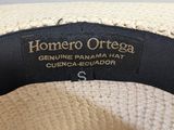 a close up of a hat with a label on it