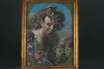 painting of a woman with flowers in her hair in a gold frame