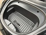 a close up of the inside of a car with the door open