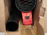 a cardboard box with a blow dryer inside of it