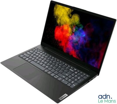 a close up of a laptop on a white surface with a colorful background