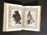 an old book with a drawing of a man and a woman standing next to each other