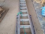 a ladder that is laying on the ground in a garage