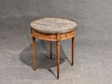 an image of a small table with a marble top on a grey background