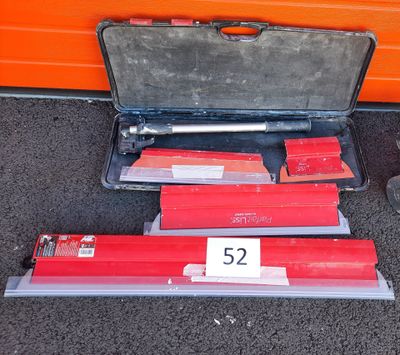 a suitcase that has some red boxes inside of it