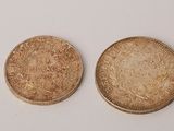 two gold coins, one of which is a sovereign and the other of which is a sovereign