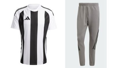 a white and black soccer jersey and pants