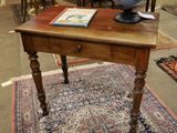 a small table with a globe on top of it