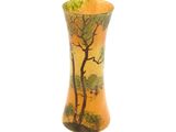 a vase with a painting on it on a white background