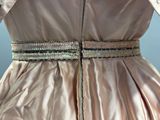 a close up of a dress with a zipper on the back