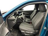the interior of a car with the door open and the driver ' s seat up