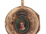 an image of a gold pocket watch with a picture of a child
