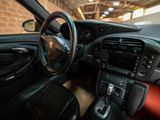 a picture of a car with a steering wheel and dashboard