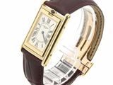 an image of a wrist watch with roman numerals on it
